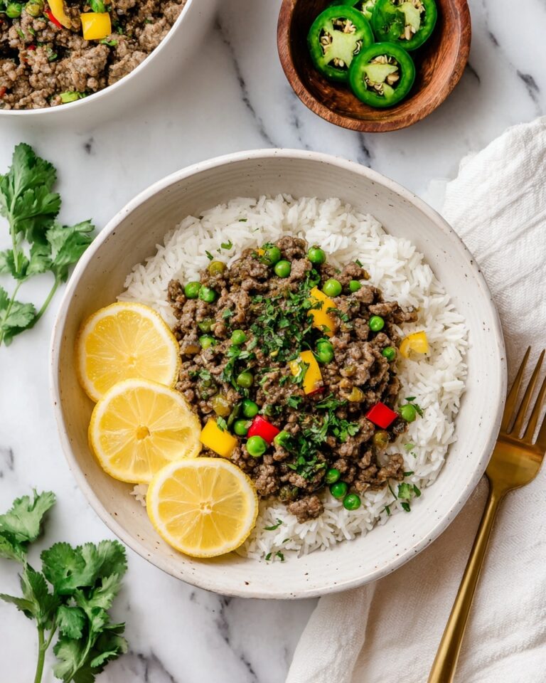 Cuban Picadillo: Savory Ground Beef Hash with Olives, Raisins, and Spices Recipe